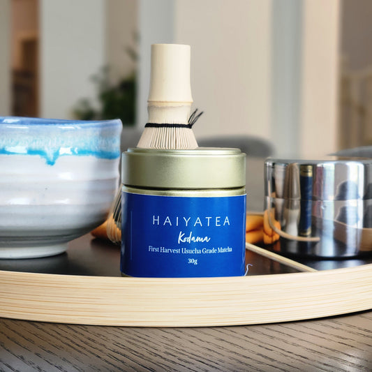 HAIYATEA Kodama matcha on a wooden surface with a blurred background